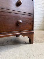 An Antique Oak English Chest of Drawers on Bracket Feet c. 1820