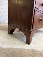 An Antique Oak English Chest of Drawers on Bracket Feet c. 1820