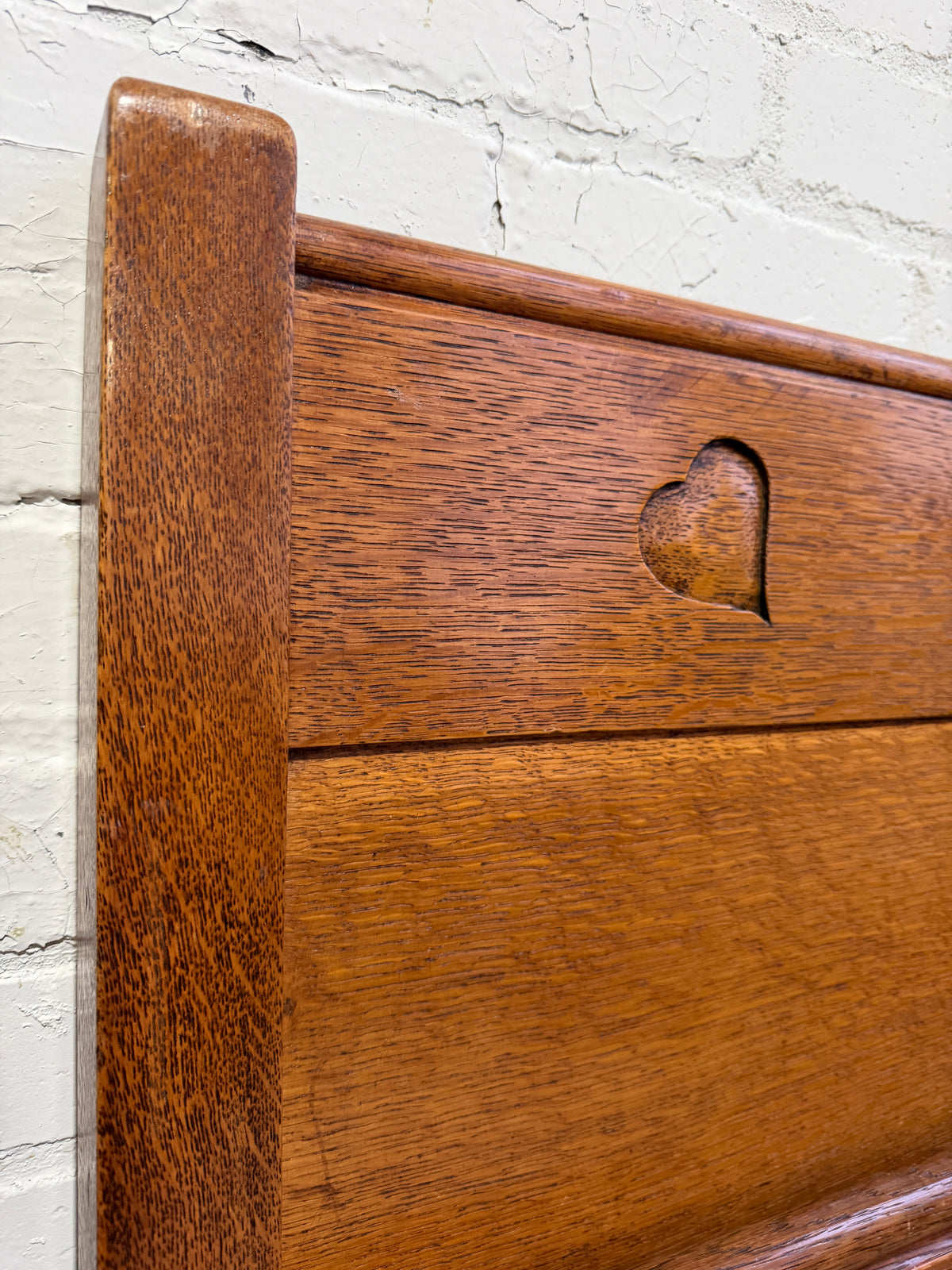 A Pair of Edwardian Heart Motif Beds by Liberty of London
