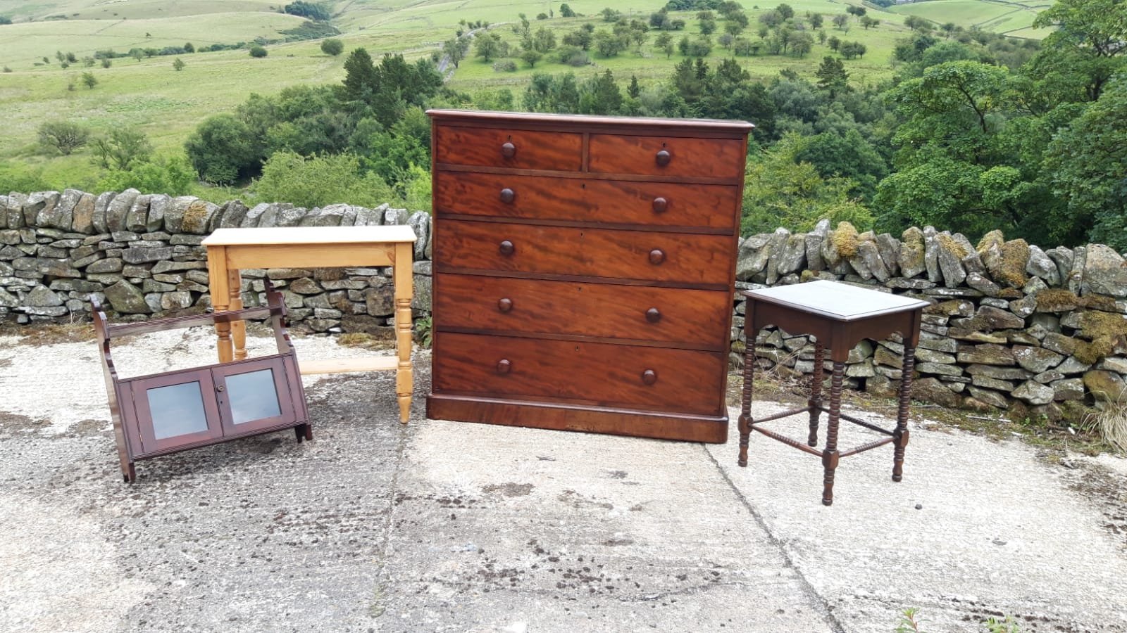 An Antique English Flame Mahogany Chest of Drawers c.1860