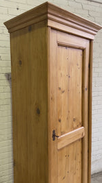 A Tall and Narrow Antique Pine European Cupboard with Bottom Drawer c. 1900