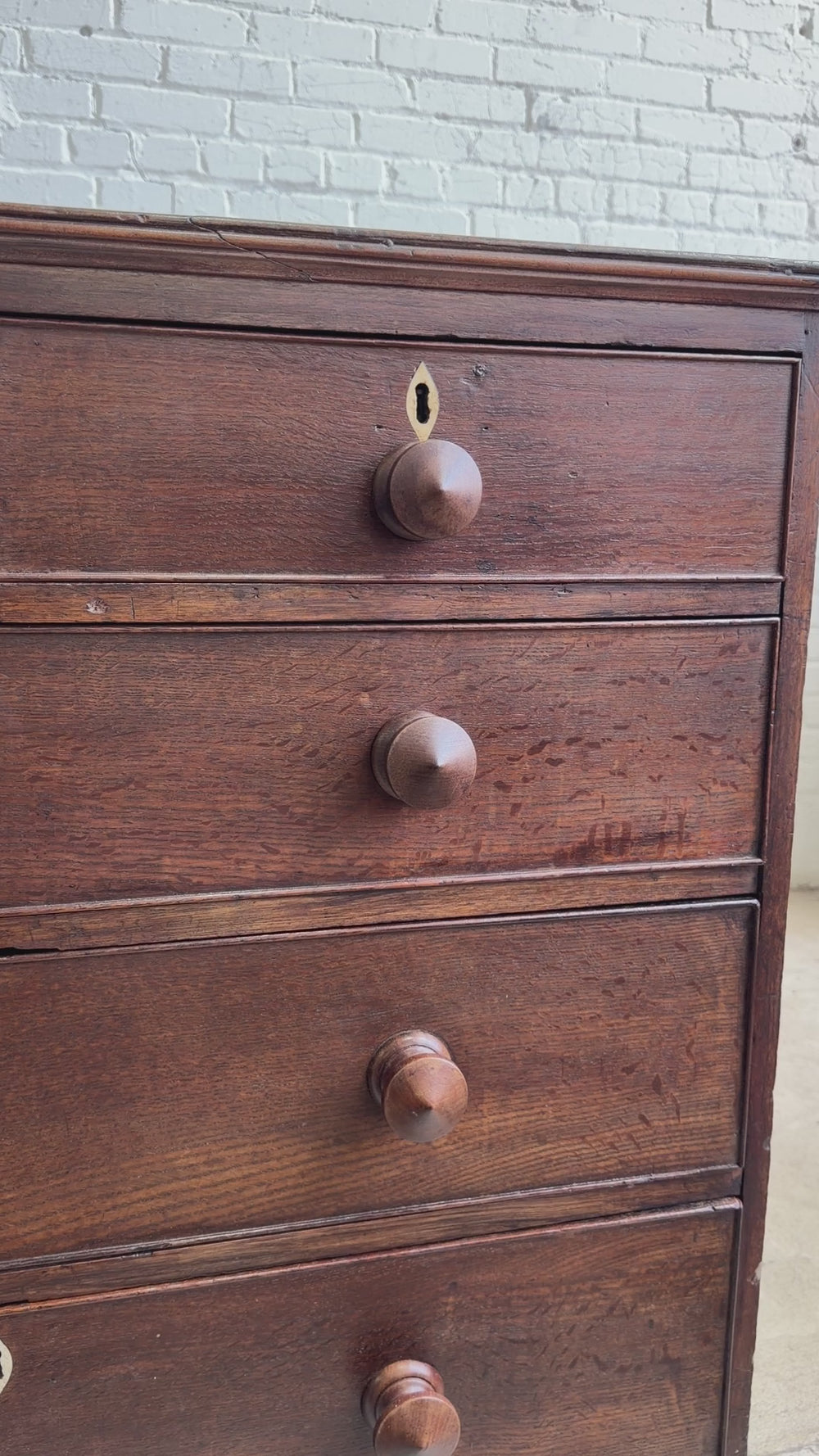 An Antique Oak English Chest of Drawers on Bracket Feet c. 1820