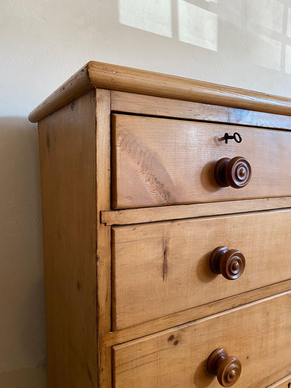 Antique English Chest of Drawers with Mahogany Knobs and Master Key